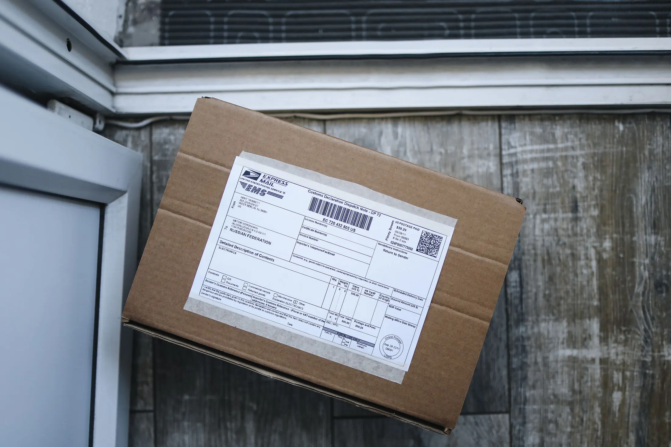 A labelled parcel waiting at the door